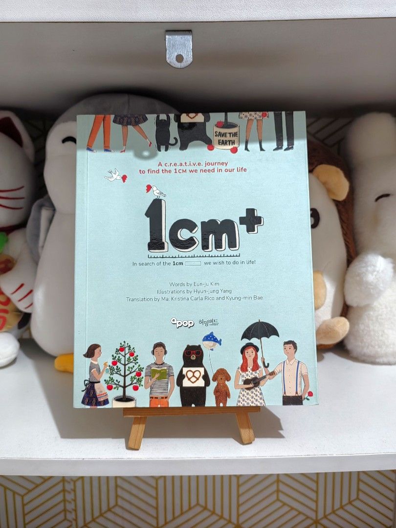 APOP 1cm+ (1cm Plus) Self Help Book by Eun-ju Kim (Category: Storybooks) located in San Jose del Monte. Submitted by chimkenugets (Listing ID 1465942989, Image 1). Description: Original Qpop × Hummingbird English translation A beautifully illustrated Korean bestseller full of short essays, witty insights and creative prompts. It encourages you to find the small "1cm" change that makes everyday life more creative and meaningful. Perfect for journa