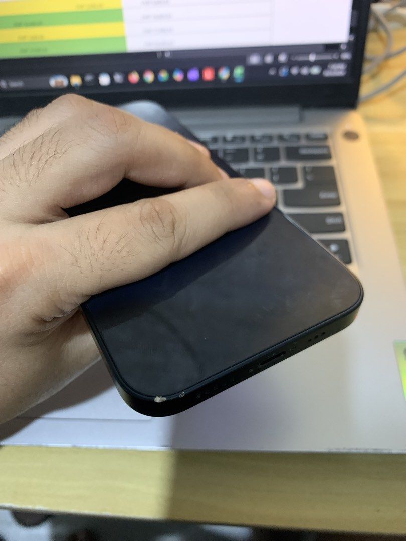Apple iPhone 13 Black (Category: iPhone 13 Series) located in Las Pinas. Submitted by escanor3112 (Listing ID 1465764266, Image 2). Description: - Model: Black iPhone 13 (Dual camera, glossy black glass back) - 128GB - 81% battery health - napalitan na LCD - Condition: Fully working, handles daily tasks with ease; has paint chip near the bottom corner edge - may mga dents hindi pwede sa maarte - Features: Standard side buttons, volume rockers, mu