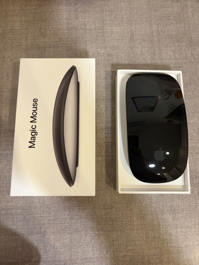 Apple Magic Mouse Black MMMQ3ZA/A (Category: Mouse & Mousepads) located in Manila. Submitted by vintagetoyz (Listing ID 1465841613, Image 2). Description: - Brand: Apple Magic Mouse - Color: Sleek Black - Model: MMMQ3ZA/A (A1657) - Condition: almost new, barely used - Manufactured: September 2023 - Features: Rechargeable design, compatible with Mac - Packaging: Original box included.