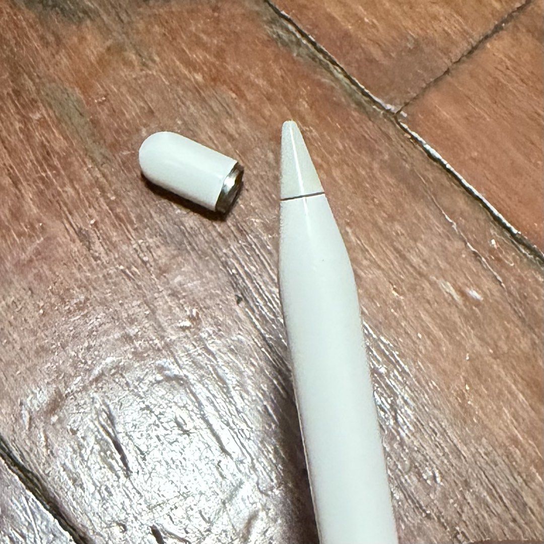 Apple Pencil 1st Generation (Category: Other Accessories) located in Quezon City. Submitted by blytheu (Listing ID 1465845547, Image 2). Description: - Authentic Apple Pencil 1st Generation - Charges and pairs directly via Lightning connector - Normal signs of handling, tip screws off smoothly - Compatible with older iPad models supporting Lightning accessories.