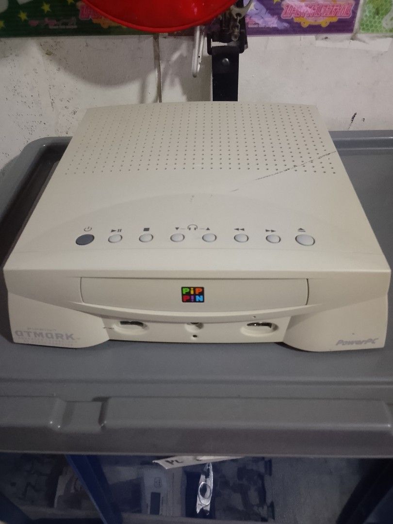 Apple x Bandai Pippin rare 1996 (Category: PlayStation) located in Manila. Submitted by herbertantazo (Listing ID 1465948982, Image 1). Description: sampaloc manila very rare apple and bandai collaboration - Item: Bandai Pippin Atmark Multimedia Game Console (Model PA-82001) - Manufacturer: Mitsubishi Electric (Made in Japan, 1996) - Hardware: PowerPC processor, cream-colored casing with top ventilation - Ports: Multiple audio/video ports, VGA po