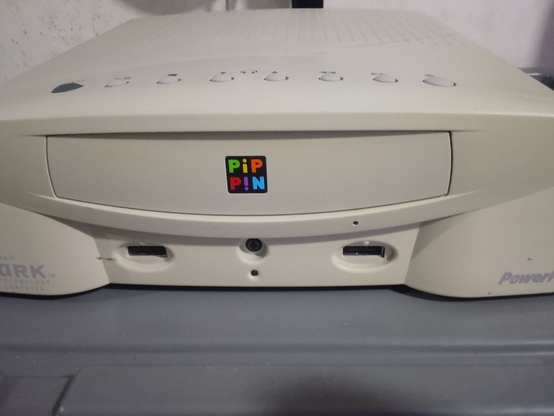 Apple x Bandai Pippin rare 1996 (Category: PlayStation) located in Manila. Submitted by herbertantazo (Listing ID 1465948982, Image 2). Description: sampaloc manila very rare apple and bandai collaboration - Item: Bandai Pippin Atmark Multimedia Game Console (Model PA-82001) - Manufacturer: Mitsubishi Electric (Made in Japan, 1996) - Hardware: PowerPC processor, cream-colored casing with top ventilation - Ports: Multiple audio/video ports, VGA po