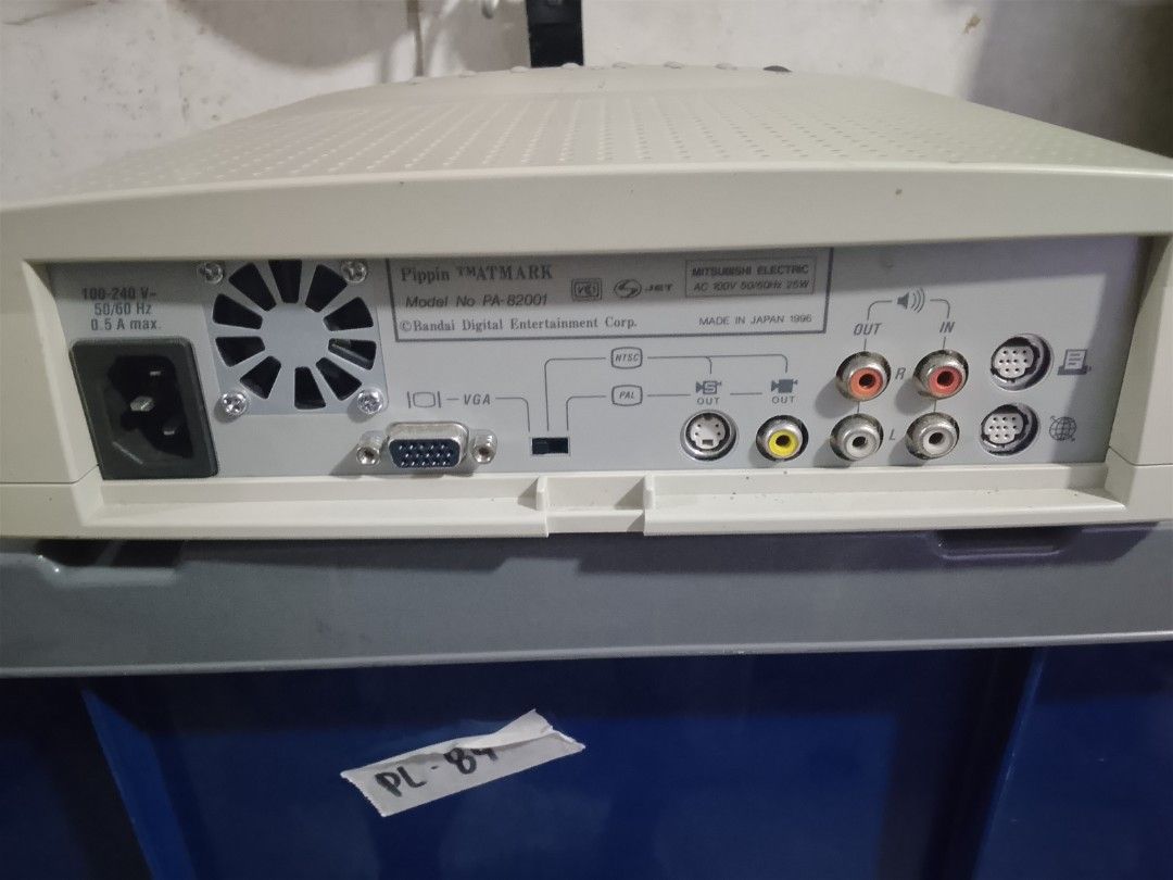 Apple x Bandai Pippin rare 1996 (Category: PlayStation) located in Manila. Submitted by herbertantazo (Listing ID 1465948982, Image 3). Description: sampaloc manila very rare apple and bandai collaboration - Item: Bandai Pippin Atmark Multimedia Game Console (Model PA-82001) - Manufacturer: Mitsubishi Electric (Made in Japan, 1996) - Hardware: PowerPC processor, cream-colored casing with top ventilation - Ports: Multiple audio/video ports, VGA po