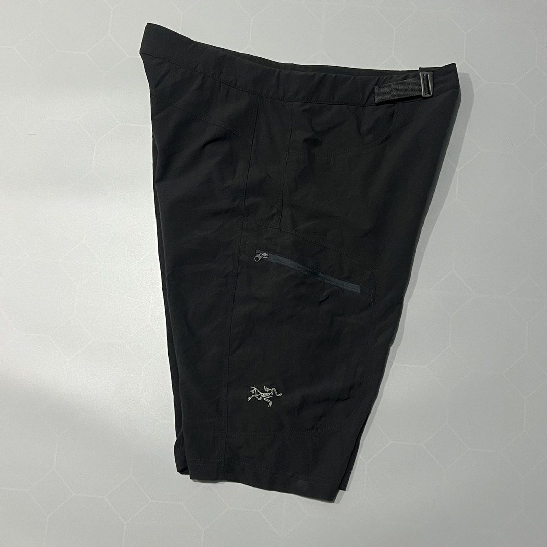 Arc'teryx Black Hiking Shorts (Category: Shorts) located in Caloocan City. Submitted by lostarchive_55 (Listing ID 1465915898, Image 2). Description: - Brand: Arc'teryx - Color: Black - Material: Lightweight, stretchy technical fabric for maximum comfort - Features: Integrated adjustable webbing belt and secure zippered thigh pocket - Details: Embroidered Arc'teryx bird logo near the hem - Condition: Clean finish inside and out, great for hiking 