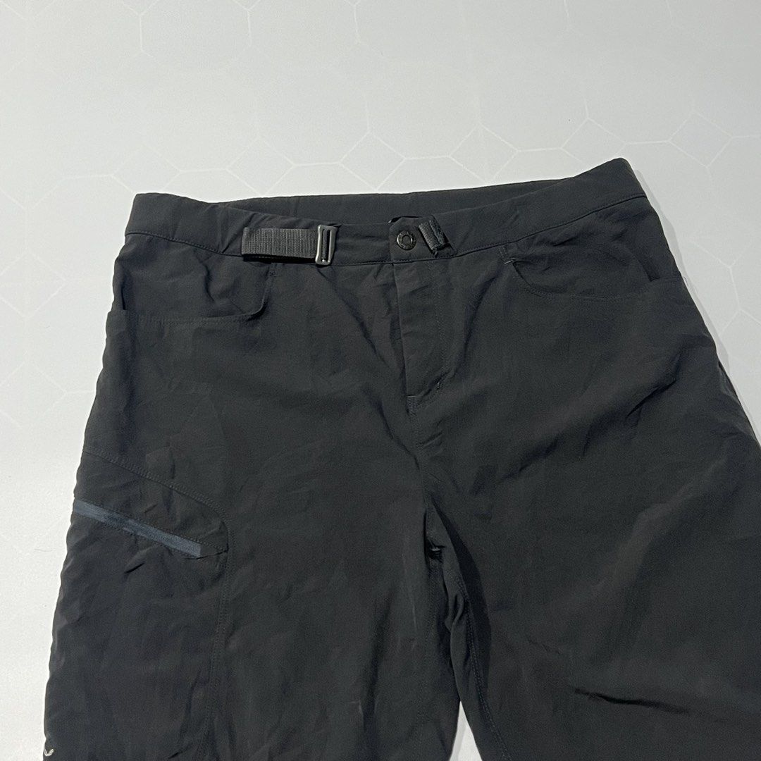 Arc'teryx Black Hiking Shorts (Category: Shorts) located in Caloocan City. Submitted by lostarchive_55 (Listing ID 1465915898, Image 3). Description: - Brand: Arc'teryx - Color: Black - Material: Lightweight, stretchy technical fabric for maximum comfort - Features: Integrated adjustable webbing belt and secure zippered thigh pocket - Details: Embroidered Arc'teryx bird logo near the hem - Condition: Clean finish inside and out, great for hiking 