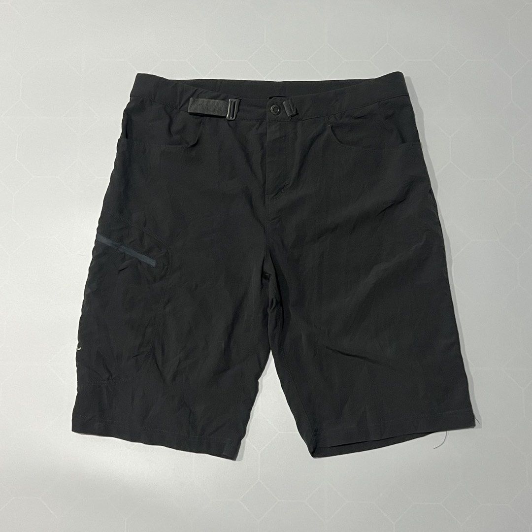 Arc'teryx Black Hiking Shorts (Category: Shorts) located in Caloocan City. Submitted by lostarchive_55 (Listing ID 1465915898, Image 1). Description: - Brand: Arc'teryx - Color: Black - Material: Lightweight, stretchy technical fabric for maximum comfort - Features: Integrated adjustable webbing belt and secure zippered thigh pocket - Details: Embroidered Arc'teryx bird logo near the hem - Condition: Clean finish inside and out, great for hiking 