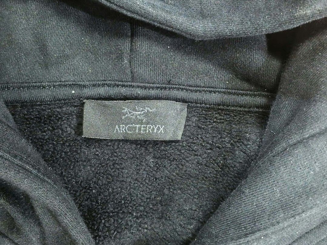 Arc'teryx Black Skeleton Zip-Up Hoodie (Category: Coats, Jackets and Outerwear) located in Manila. Submitted by iyoksoc (Listing ID 1465917199, Image 3). Description: - Brand: Arc'teryx - Color: Solid Black - Design: Small chest logo and large white skeleton graphic on the back - Features: Full front metal zipper, kangaroo pockets, ribbed cuffs and hem - Comfort: Heavyweight fleece lining inside.