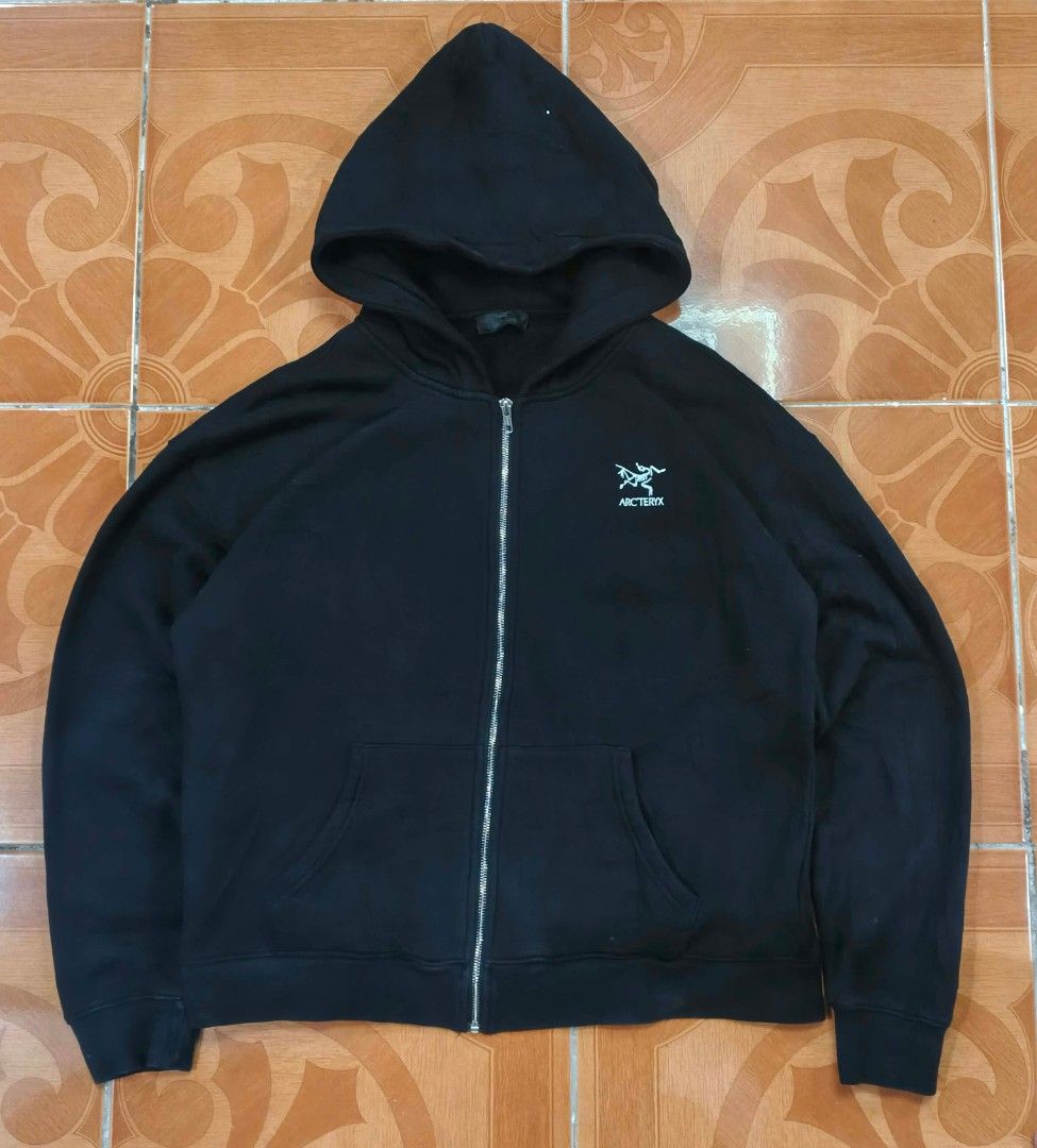 Arc'teryx Black Skeleton Zip-Up Hoodie (Category: Coats, Jackets and Outerwear) located in Manila. Submitted by iyoksoc (Listing ID 1465917199, Image 1). Description: - Brand: Arc'teryx - Color: Solid Black - Design: Small chest logo and large white skeleton graphic on the back - Features: Full front metal zipper, kangaroo pockets, ribbed cuffs and hem - Comfort: Heavyweight fleece lining inside.