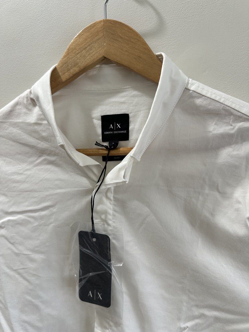 Armani Exchange Button Down Shirt (Category: Formal Shirts) located in Baguio. Submitted by .daryl (Listing ID 1465846777, Image 2). Description: 20 width 29 length .