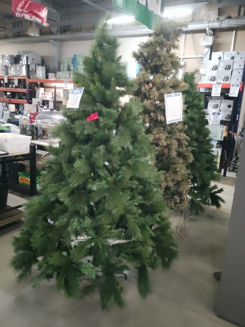 Artificial Christmas Tree Green Pine (Category: Artificial Plants & Flowers) located in Manila. Submitted by fiercehorse_40fdc9 (Listing ID 1465770392, Image 1). Description: - Large artificial Christmas tree with lush green foliage - Sturdy branches designed to hold heavy ornaments easily - Includes a durable metal base for stability - Quick and hassle-free setup for living rooms or offices - Perfect and ready for your holiday decorating.
