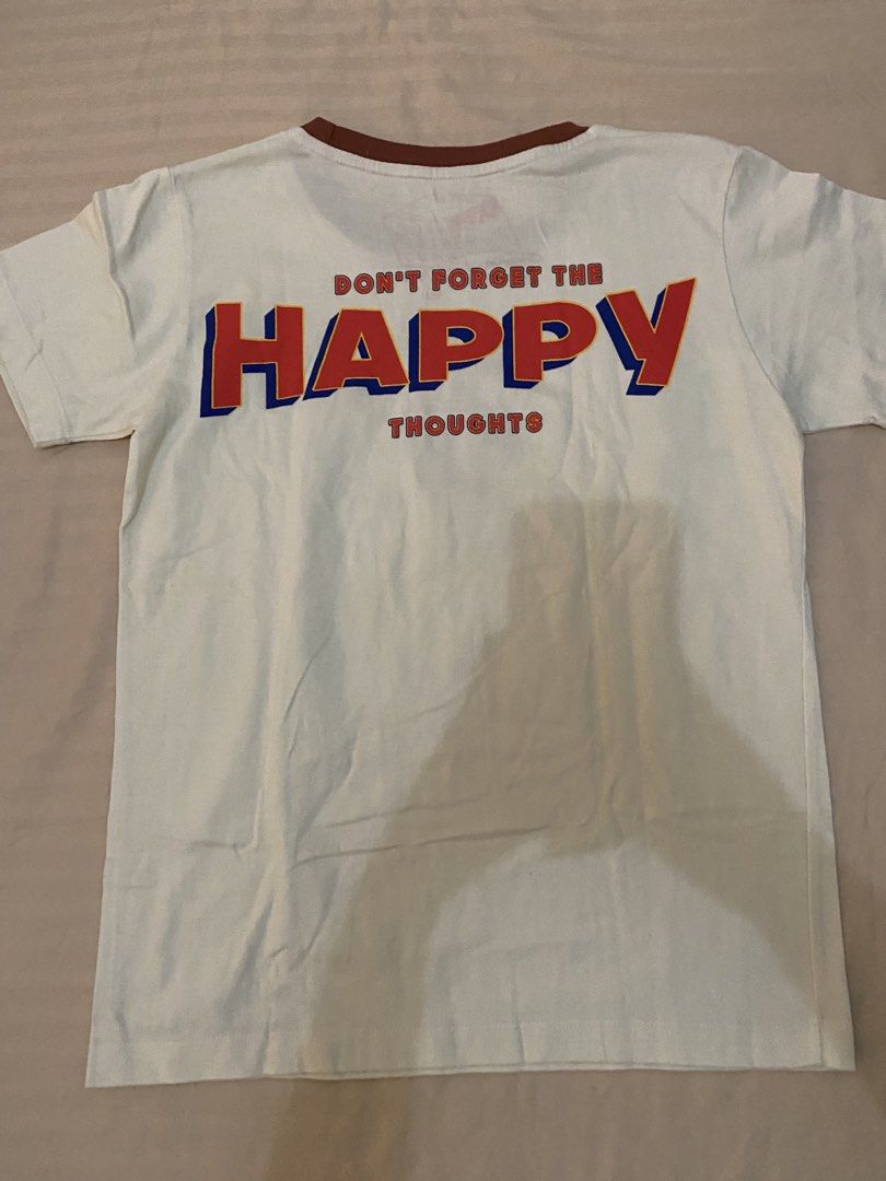 Artwork Balloon Ringer T-Shirt Size M (Category: Shirts) located in Cebu City. Submitted by hailey_sells (Listing ID 1465823165, Image 2). Description: RUSSEL UP HALLOWEEN COSTUME IDEA - Color: Off-white with brown collar trim - Design: Small balloon graphic on chest, large text on the back - Material: Soft and breathable cotton.