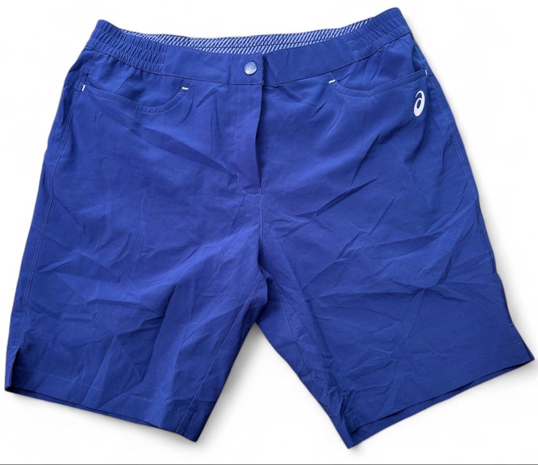 ASICS Blue Athletic Shorts Size 70 (Category: Shorts) located in Iloilo. Submitted by oddforest.c9c7d5 (Listing ID 1465808974, Image 1). Description: - Brand: ASICS - Color: Bright blue - Condition: Clean, no flaws - Waistband: Elastic with secure button and hook closure - Material: Lightweight, breathable fabric with mesh panels - Features: Convenient side pockets for essentials.