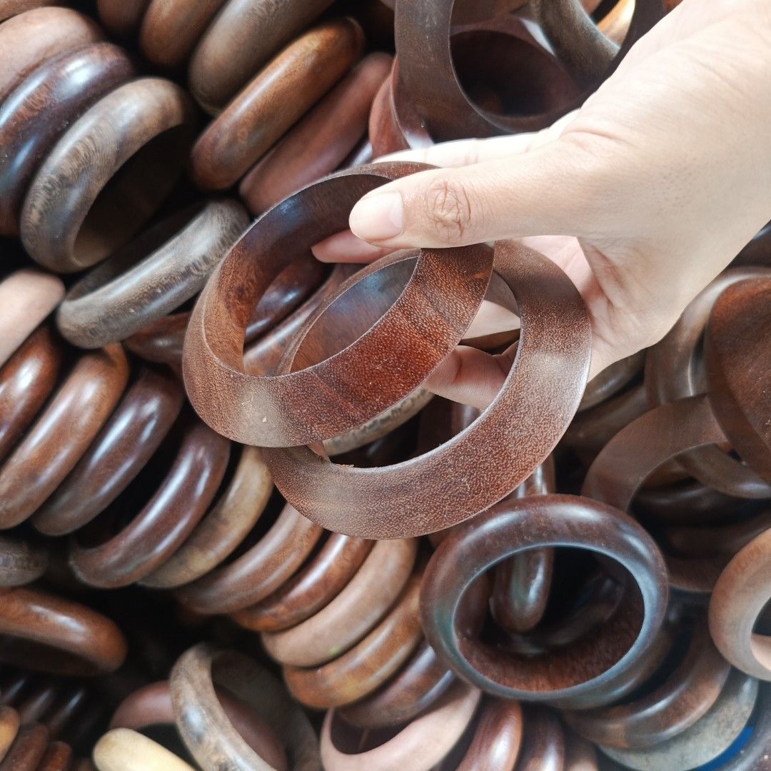 Assorted Wooden Bangle Bracelets Bulk Lot (Category: Bracelets) located in Bulacan. Submitted by snumxxx (Listing ID 1465845644, Image 3). Description: Bulk lot of chunky wooden bangle bracelets in a rich dark brown wood grain. Smooth polished finish, perfect for daily stacking, crafting, or resale. Open for bulk orders!.