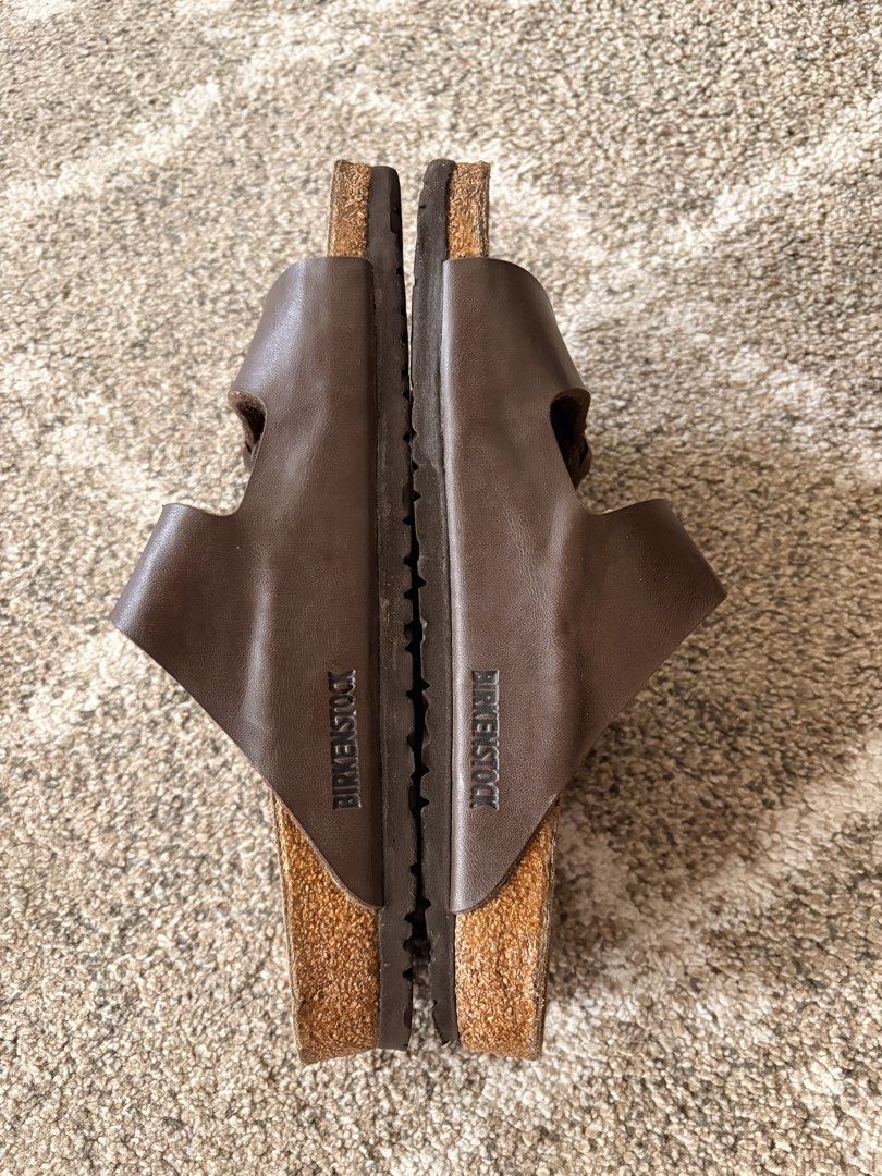 Auth Preloved Arizona Birkenstock (Category: Slippers & Slides) located in Paranaque City. Submitted by silentstone.dolphin (Listing ID 1465805898, Image 3). Description: Chocolate Brown Color.. Brass Buckle.. Visible Print.. Size 43RF.. Clean&Ready to Wear✅ Super Gwapo in Actual😍.