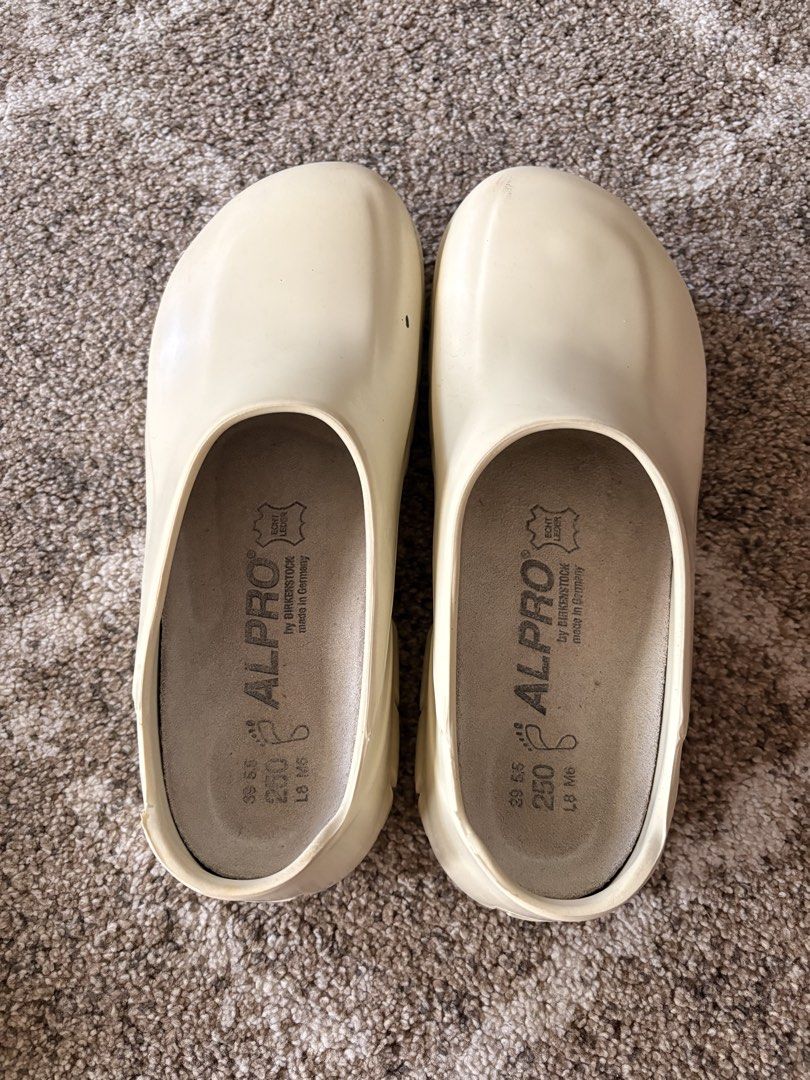 Auth Preloved Birkenstock Alpro Clogs (Category: Slippers & Slides) located in Paranaque City. Submitted by silentstone.dolphin (Listing ID 1465830279, Image 2). Description: Chef Clogs/Garden/Carpenter's Clogs Off White/Cream Color.. Visible Print.. Size 39.. Clean&Ready to Wear✅ Super Nice in Actual😍.