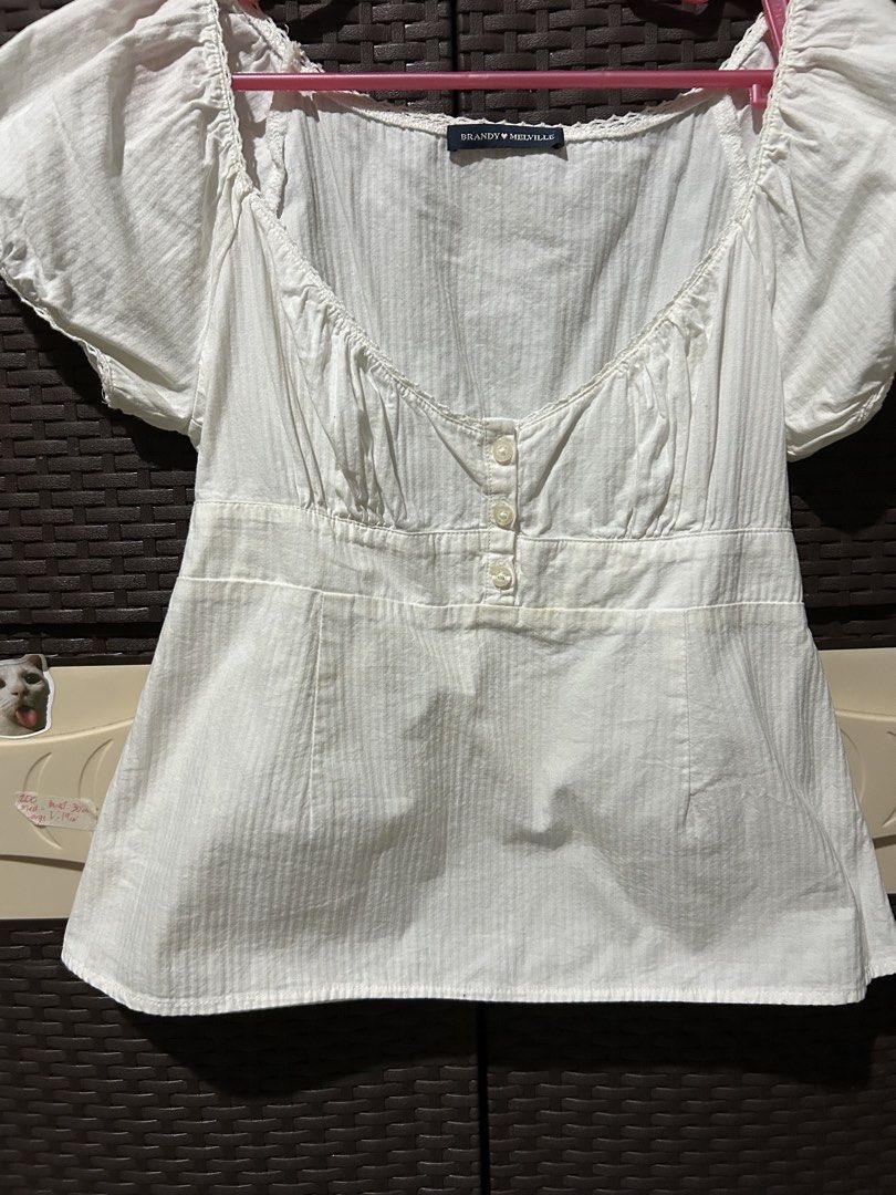 AUTHENTIC Brandy Melville Blair Top (Category: Blouses) located in Dagupan City. Submitted by matchaisinlove (Listing ID 1465763403, Image 2). Description: ‎╭──────────˙ . ꒷ 🍵 . 𖦹˙─╮ MINE:₱750 + sf (first to pay) ‎╰─˙ . ꒷ 🍵 . 𖦹˙──────────╯ brand: Brandy Melville flaw: stains (not sure if natatanggal) size: freesize 𝓶𝓸𝓭: 𝙹𝙽𝚃 𝓶𝓸𝓹: 𝚐𝚌𝚊𝚜𝚑 — Read my RULES! — thrifted so pls do manage your expectations. ❗no return & cancellation. 🌷fe