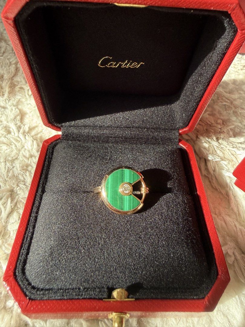 Authentic Cartier Amullete Malachite Large Model (Category: Rings) located in Makati City. Submitted by aurummaison (Listing ID 1462908530, Image 2). Description: With paper bag, inner and outer box Can di meet up at cartier greenbelt.