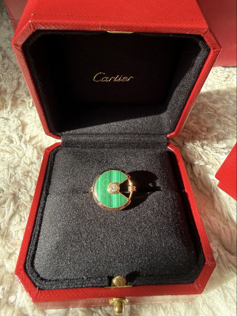 Authentic Cartier Amullete Malachite Large Model (Category: Rings) located in Makati City. Submitted by aurummaison (Listing ID 1462908530, Image 1). Description: With paper bag, inner and outer box Can di meet up at cartier greenbelt.