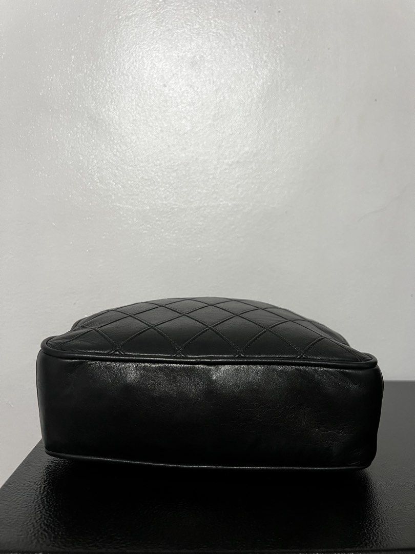 Authentic Chanel Diamond quilted matellasse coco charm half moon (Category: Luxury Bags & Wallets) located in Tacloban City. Submitted by classy_luxury (Listing ID 1465810484, Image 2). Description: Authentic Chanel Diamond Quilted Matellase coco charm Half moon Guaranteed authentic Black lambskin leather Vintage from 1986-1988 W 21.5 cm x H 16.5 cm x D 7cm Interior 2 zipped pockets, both runs fine. Great condition, nice and clean no peeling or s