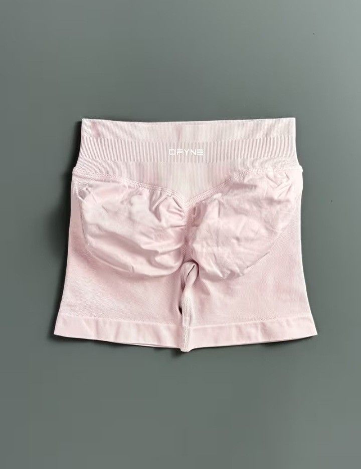 Authentic DFYNE Pink Butt Lifting Short (Category: Activewear) located in Binan City. Submitted by shopwme_vintage.com (Listing ID 1465903898, Image 1). Description: DFYNE Pink Butt-Lifting Shorts | Size M - Authentic DFYNE Shorts - Flattering butt-lifting / contouring fit - High-waisted design - Stretchy & comfortable material - Beautiful soft pink color - Size: Medium (M) Perfect for gym, workouts, or anyone who loves that snatched + sculpted l