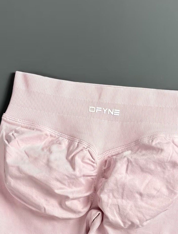 Authentic DFYNE Pink Butt Lifting Short (Category: Activewear) located in Binan City. Submitted by shopwme_vintage.com (Listing ID 1465903898, Image 3). Description: DFYNE Pink Butt-Lifting Shorts | Size M - Authentic DFYNE Shorts - Flattering butt-lifting / contouring fit - High-waisted design - Stretchy & comfortable material - Beautiful soft pink color - Size: Medium (M) Perfect for gym, workouts, or anyone who loves that snatched + sculpted l