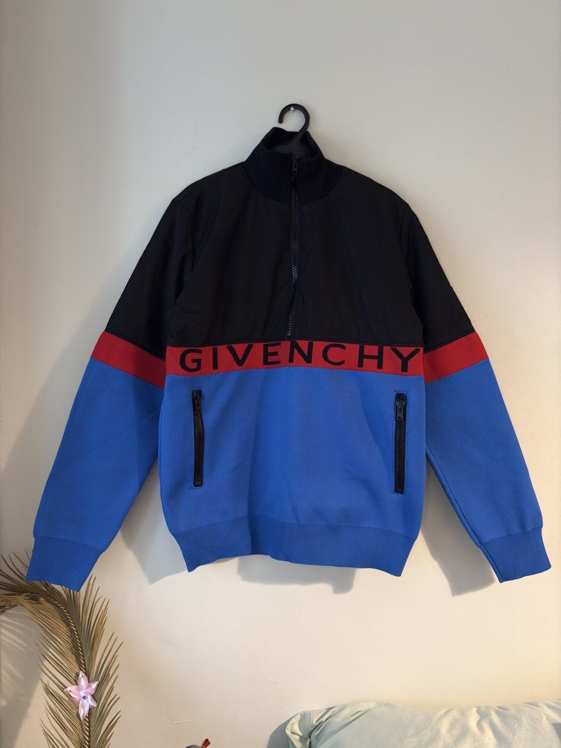 Authentic Givenchy Color Block Retro Half-Zip Jacket (Category: Luxury Apparel) located in Mandaluyong City. Submitted by material_boi (Listing ID 1465850631, Image 1). Description: Made in Portugal. Code is 18S 6014 300 which indicate this was a 2018 collection by Clare Waight Keller. Pa-turtle neck. Top fabric is parang nylon with lining. Bottom fabric is parang knitted na stretchy. Riri zippers. Tag says size L approx 20 inches wide and 27 inc