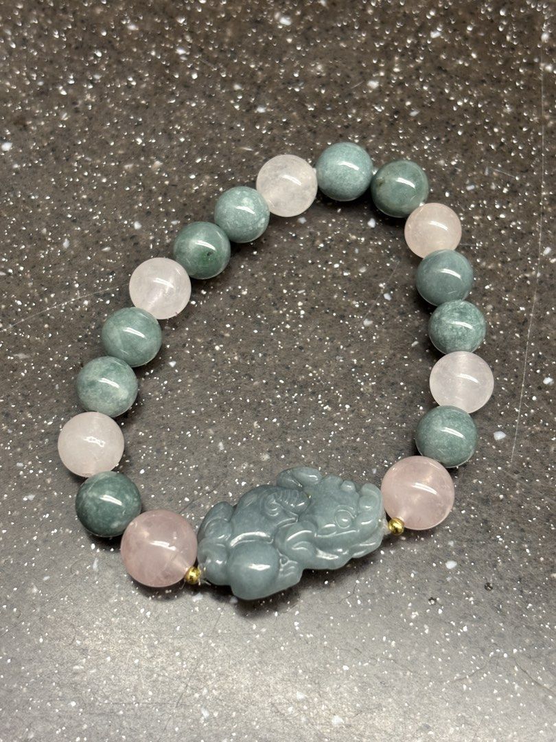 Authentic Jade Bracelet with Pixiu (Category: Bracelets) located in Quezon City. Submitted by bingbnb (Listing ID 1465772612, Image 1). Description: - Genuine jade bracelet - Features a detailed carved Pixiu charm for good fortune - Accented with elegant gold-tone spacer beads - Convenient stretch cord construction - fits wrist size around 15cm (XS) - bought from @gemsolestudios.ph.