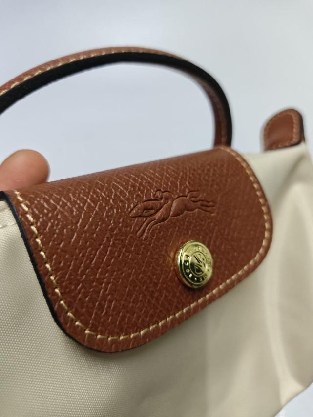 Authentic Long Champ Mini Sling Brand new (Category: Cross-body Bags) located in Echague. Submitted by grateful27 (Listing ID 1465833516, Image 2). Description: .
