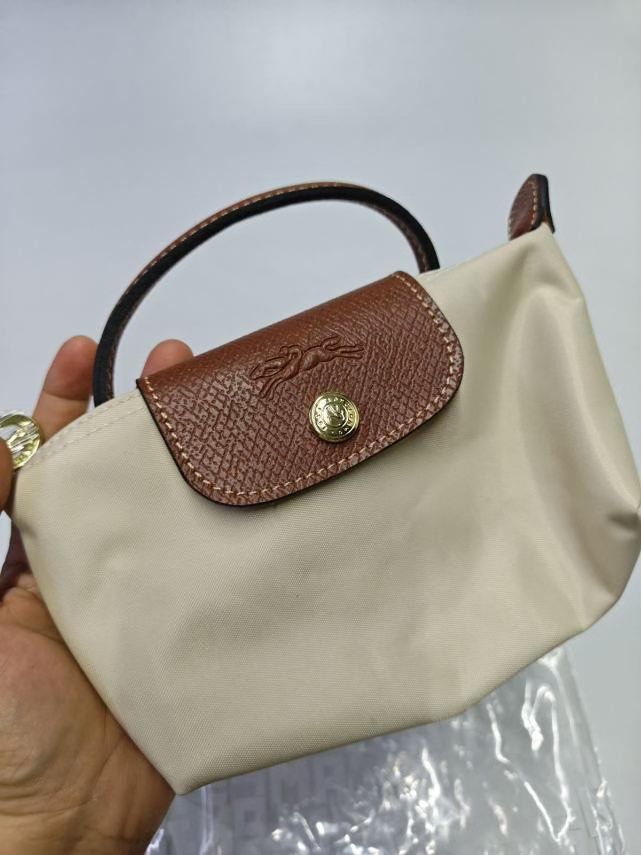 Authentic Long Champ Mini Sling Brand new (Category: Cross-body Bags) located in Echague. Submitted by grateful27 (Listing ID 1465833516, Image 1). Description: .