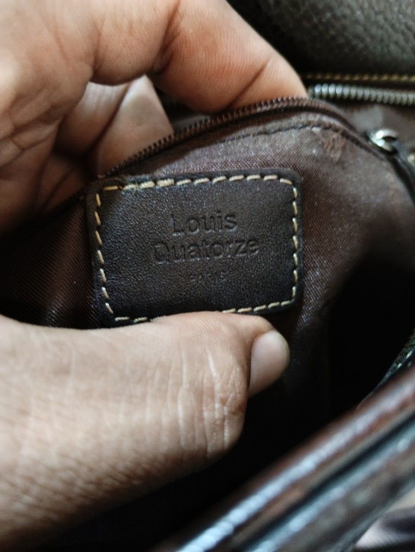 AUTHENTIC LOUIS QUATORZE Crossbody Bag ✅ (Category: Sling Bags) located in Cagayan de Oro. Submitted by warmbird-f84aab (Listing ID 1465770614, Image 3). Description: 💯 100% GENUINE — Verified & Authenticated ▫️ Brand: Louis Quatorze ▫️ Style: Daily Crossbody / Messenger Bag ▫️ Material: Premium dark brown pebbled leather — ages beautifully ▫️ Strap: Adjustable woven strap with embroidered logo ▫️ Interior: Signature monogram lining, multiple po
