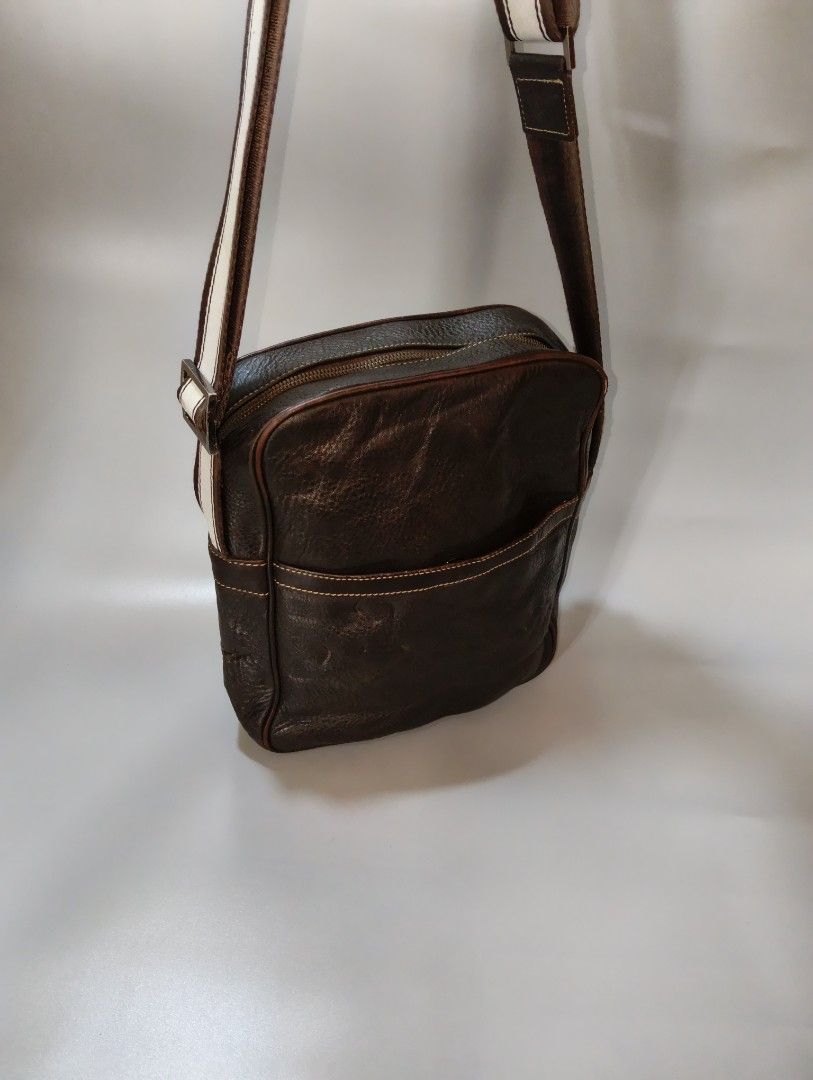AUTHENTIC LOUIS QUATORZE Crossbody Bag ✅ (Category: Sling Bags) located in Cagayan de Oro. Submitted by warmbird-f84aab (Listing ID 1465770614, Image 2). Description: 💯 100% GENUINE — Verified & Authenticated ▫️ Brand: Louis Quatorze ▫️ Style: Daily Crossbody / Messenger Bag ▫️ Material: Premium dark brown pebbled leather — ages beautifully ▫️ Strap: Adjustable woven strap with embroidered logo ▫️ Interior: Signature monogram lining, multiple po