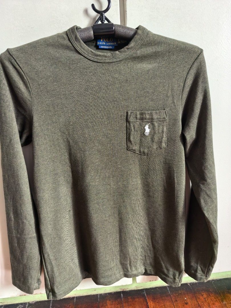 Authentic Ralph Lauren long sleeve pocket tshirt (Category: Coats, Jackets and Outerwear) located in Mandaluyong City. Submitted by japs2 (Listing ID 1465836208, Image 1). Description: Authentic Ralph Lauren long sleeve pocket tshirt Color green Tag size: S custom slim fit Chest:17.5 inch length: 27 inches Bought in Japan however, a little fit for me when I got home. Never been worn. Mandaluyong or BGC area.