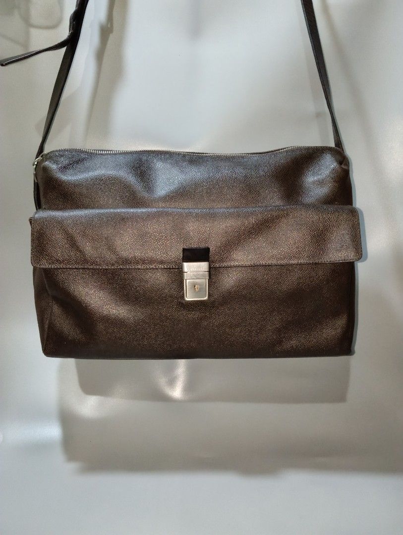 AUTHENTIC TRUSSARDI CRESPO — PERFECT OFFICE BAG! (Category: Sling Bags) located in Cagayan de Oro. Submitted by warmbird-f84aab (Listing ID 1465875289, Image 1). Description: 🇮🇹 Made in Italy • Genuine Leather ✅ 100% Authentic — Serial #: B1733462 💼 IDEAL FOR WORK / OFFICE / BUSINESS 💼 📌 Why it’s perfect for the office: - ✅ Fits laptop, documents, notebooks & all your daily essentials - ✅ Professional, elegant design — looks great in meeting