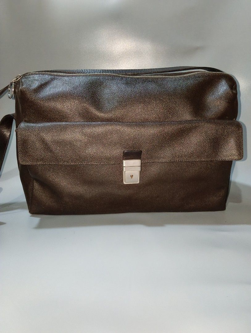 AUTHENTIC TRUSSARDI CRESPO — PERFECT OFFICE BAG! (Category: Sling Bags) located in Cagayan de Oro. Submitted by warmbird-f84aab (Listing ID 1465875289, Image 2). Description: 🇮🇹 Made in Italy • Genuine Leather ✅ 100% Authentic — Serial #: B1733462 💼 IDEAL FOR WORK / OFFICE / BUSINESS 💼 📌 Why it’s perfect for the office: - ✅ Fits laptop, documents, notebooks & all your daily essentials - ✅ Professional, elegant design — looks great in meeting