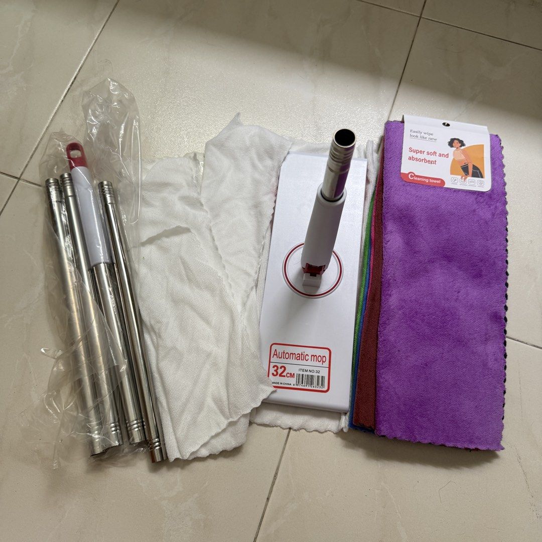 Automatic Mop (Category: Cleaning Tools & Supplies) located in Singapore. Submitted by thrifty.sale (Listing ID 1465877618, Image 1). Description: Brand New Automatic Mop Selling as this is extra Selling everything together in the photo, together with the cloths. .