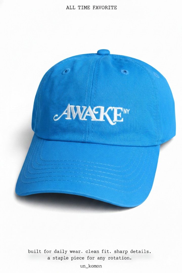 Awake NY Classic Blue Baseball Cap Hat (Category: Caps & Hats) located in Manila. Submitted by happycaps (Listing ID 1465857269, Image 1). Description: - Brand: Awake NY - Color: Bright blue with white embroidered logo - Design: Classic six-panel build with curved brim and top button detail - Fit: Adjustable strap in the back, fits most head sizes - Condition: Brand new / Clean everyday staple piece.