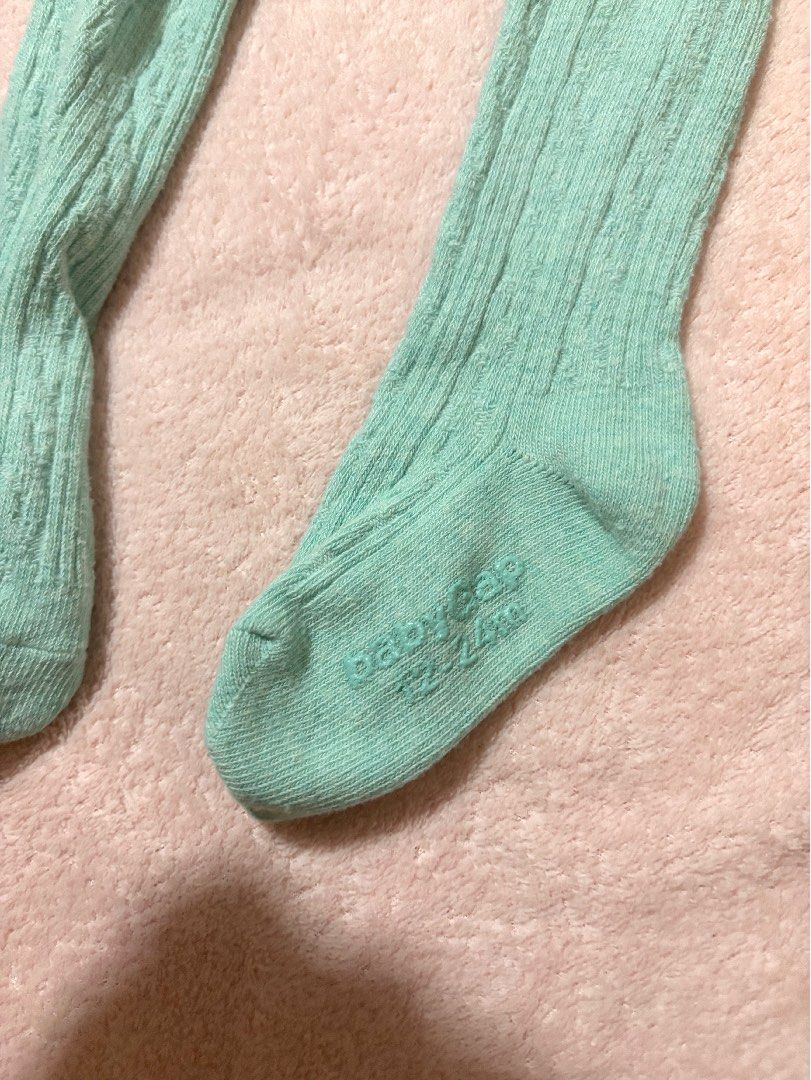 BabyGap knit footed tights (Category: Babies & Kids Fashion) located in Quezon City. Submitted by closettreasure123 (Listing ID 1465853823, Image 3). Description: 12-24months soft mint green hue, featuring a classic pointelle/cable knit pattern and an adorable brown bear face embroidered on the back.