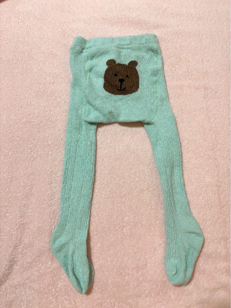 BabyGap knit footed tights (Category: Babies & Kids Fashion) located in Quezon City. Submitted by closettreasure123 (Listing ID 1465853823, Image 2). Description: 12-24months soft mint green hue, featuring a classic pointelle/cable knit pattern and an adorable brown bear face embroidered on the back.