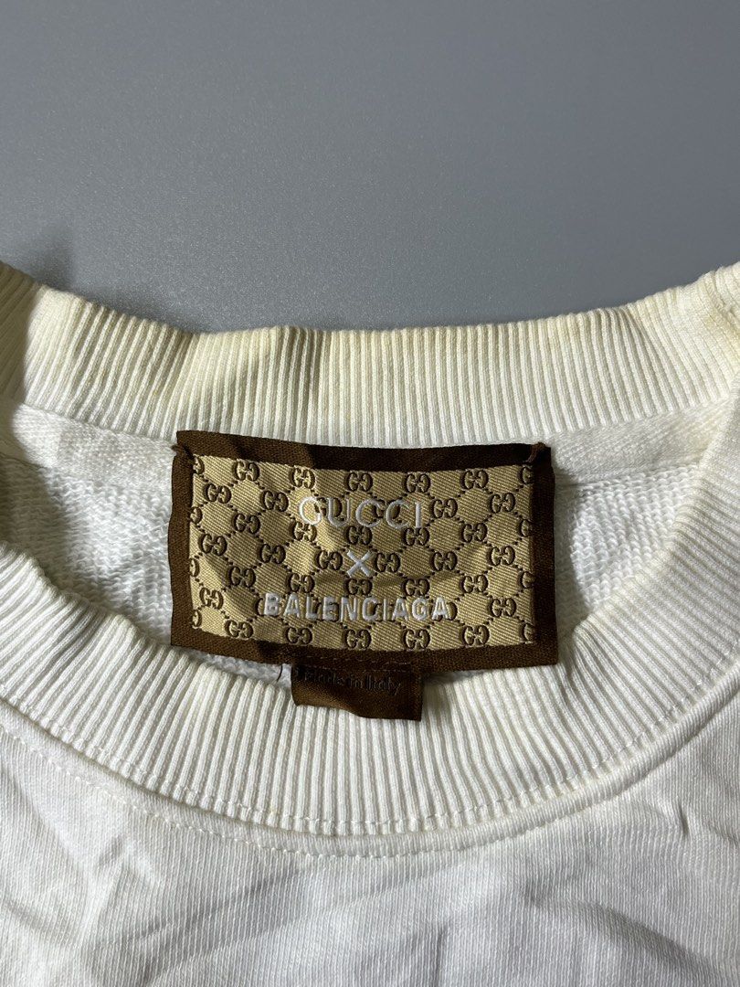 Balenciaga x Gucci Crewneck (Category: Coats, Jackets and Outerwear) located in Manila. Submitted by villadolid77084 (Listing ID 1465908092, Image 3). Description: Balenciaga x Gucci Crew neck Size Small Best Fit Large Dimes 23x27 Color rate 9.5/10 Need wash only No issue Excellent condition Price 1,500+Sf📩 Location Laspiñas📍.