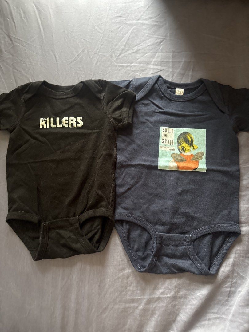 Band Baby Bodysuits (Category: Babies & Kids Fashion) located in Taguig. Submitted by trashpalace_ (Listing ID 1465842333, Image 1). Description: - Bundle includes 2 rock band baby bodysuits - 1x Black bodysuit with The Killers logo - 1x Dark navy blue bodysuit with Built to Spill album art - Short sleeves with convenient snap closures underneath - Made from soft, comfortable cotton fabric - Great gift for young music fans and cool parents - Fast