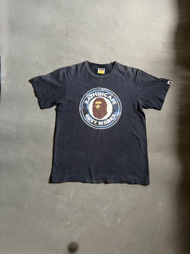 BAPE ABC Busy Works Graphic Tee (Category: Tshirts & Polo Shirts ) located in General Santos City (Dadiangas). Submitted by nofuckingli (Listing ID 1465779535, Image 1). Description: BAPE ABC Busy Works Graphic Tee Width: 20.5” Length: 28” Condition: 9.5/10 Color Rate: 9.3/10 No issues overall Needs wash.