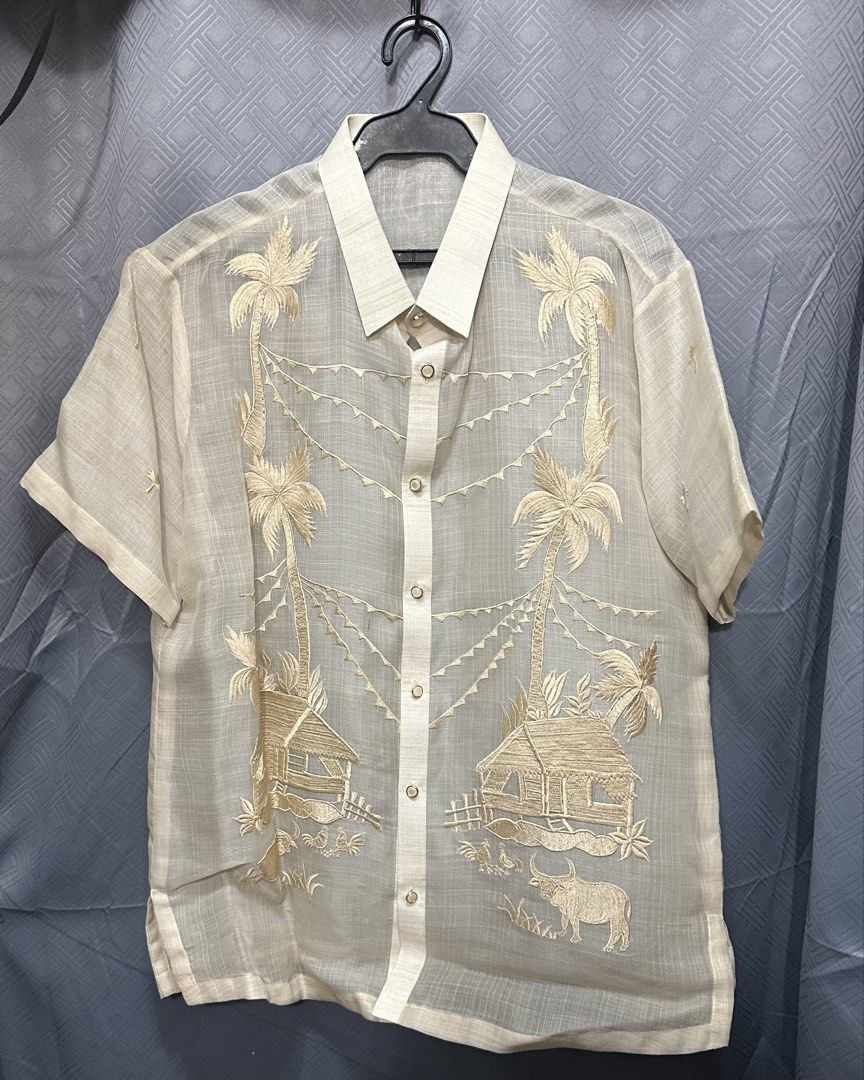 Barong Short Sleeve (Category: Tshirts & Polo Shirts ) located in Quezon City. Submitted by lyelim (Listing ID 1465841855, Image 1). Description: Selling my Pinoy Countryside-themed Barong. Customized/Bespoked by GA Barong in 2024. You can message them on Facebook for validation/confirmation na pinagawa ko sakanila. I paid ₱6,000 for this customization. • Color: Cream • Fabric: Piña Cocoon • Style: Short sleeve with button-down front and structur