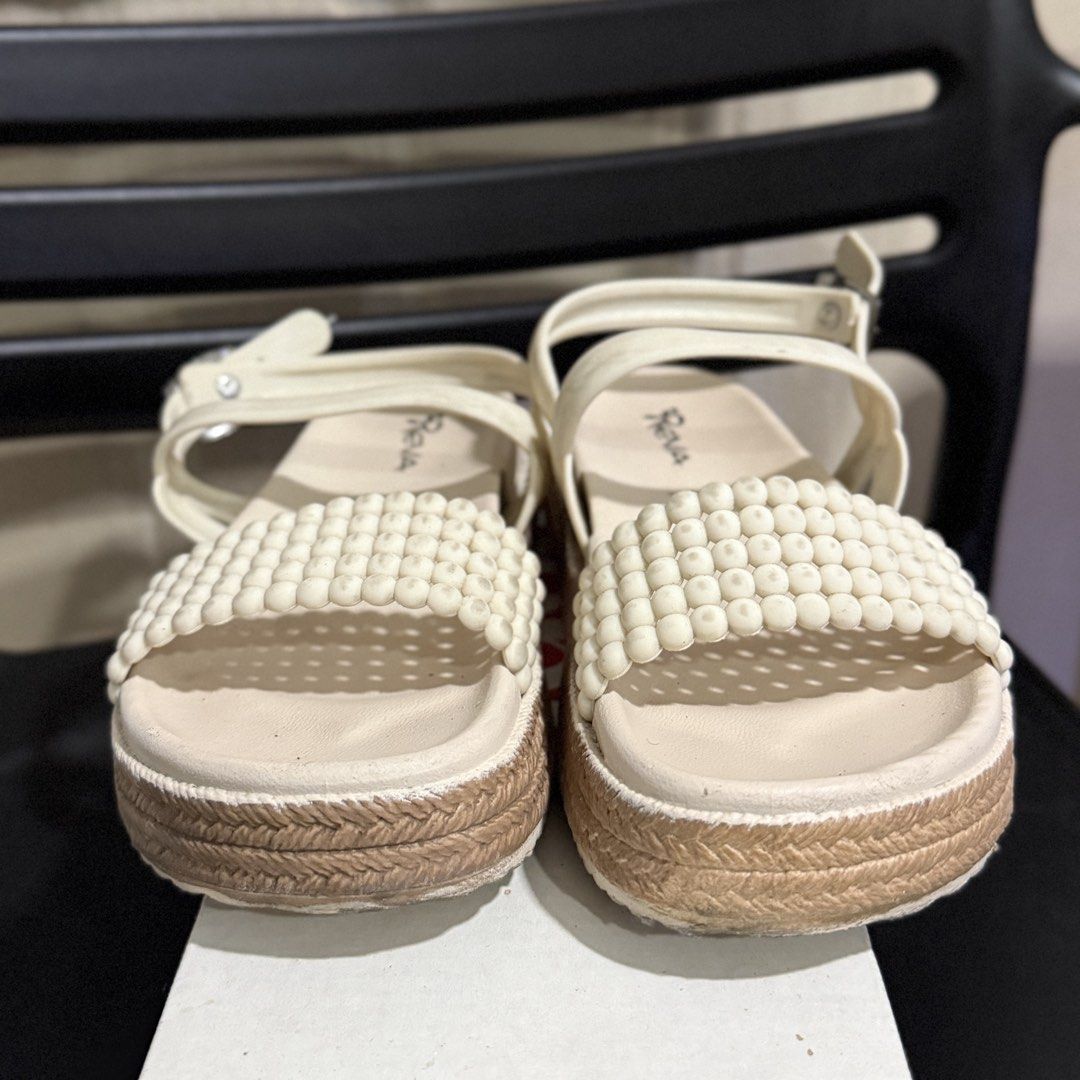 Beige Platform Sandals Cream Size 36 / Beach Sandals (Category: Sandals) located in Makati City. Submitted by julyco. (Listing ID 1465828082, Image 1). Description: - Brand: REVA - Style: Cream platform sandals with jute-wrapped sole - Size: 36 - Details: Espadrille design and adjustable ankle buckle strap - perfect for poolside or beach trips.