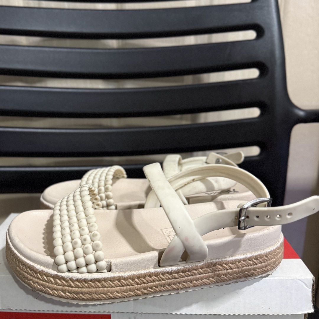 Beige Platform Sandals Cream Size 36 / Beach Sandals (Category: Sandals) located in Makati City. Submitted by julyco. (Listing ID 1465828082, Image 2). Description: - Brand: REVA - Style: Cream platform sandals with jute-wrapped sole - Size: 36 - Details: Espadrille design and adjustable ankle buckle strap - perfect for poolside or beach trips.