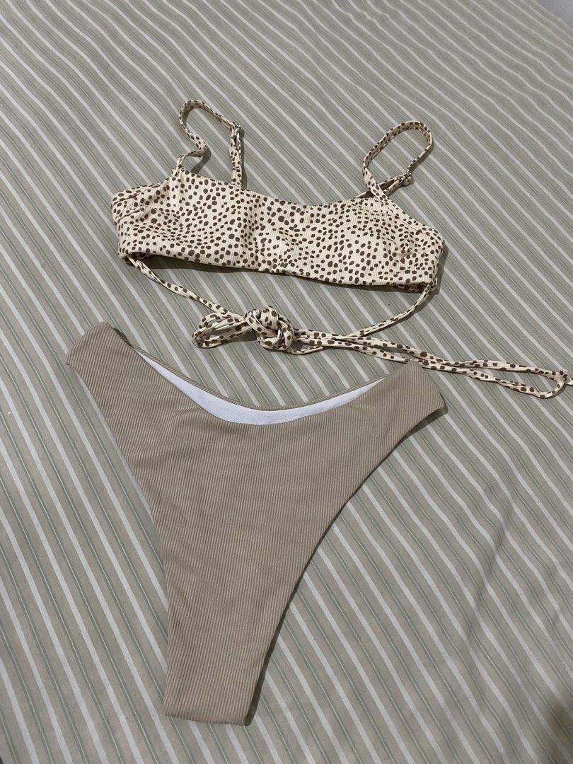 Beige Bikini Two Piece Cross Waist (Category: Bikinis & Swimsuits) located in Taguig. Submitted by ellecl (Listing ID 1465921476, Image 1). Description: - Long tie (cross waist) - Size SMALL.