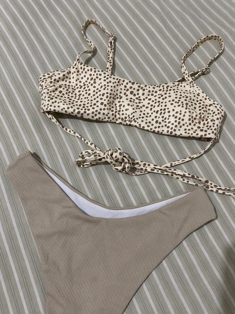 Beige Bikini Two Piece Cross Waist (Category: Bikinis & Swimsuits) located in Taguig. Submitted by ellecl (Listing ID 1465921476, Image 3). Description: - Long tie (cross waist) - Size SMALL.