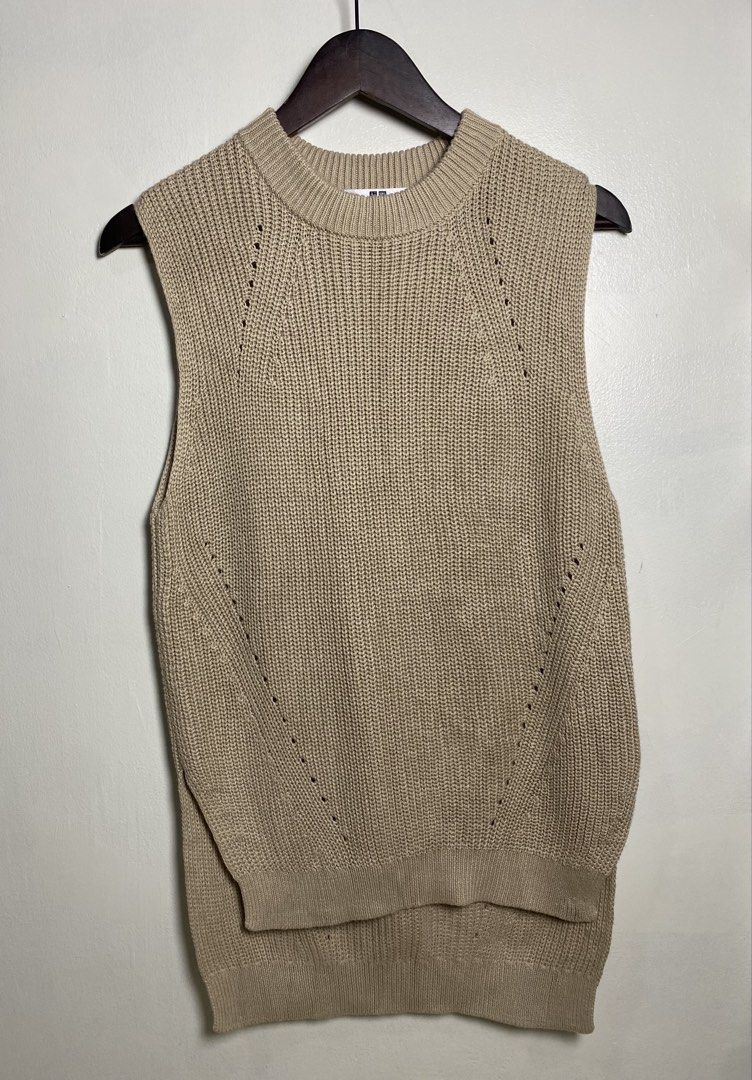 Beige high low knit vest (Category: Others Tops) located in Makati City. Submitted by indaysukaycloset (Listing ID 1465820071, Image 1). Description: BEIGE HIGH-LOW KNIT VEST Brand: UNIQLO Size: M on tag - Fits S-M Color: Beige / Light Taupe Details: - W-16 Front L-24 Back L-28 (laid flat, in inches) - Round neck sleeveless vest - High-low / longer back hem with side slits - Chunky knit with eyelet / perforated line details - Material: 100% Cotto