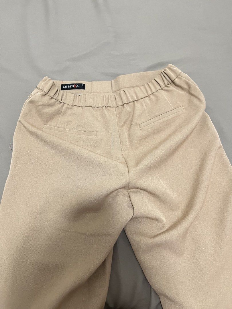 Beige Pants Size S (Category: Trousers) located in Marikina City. Submitted by maicsg_ (Listing ID 1465773339, Image 3). Description: - Brand: Essenx A - Size: S (25-26 waist) - Color: Neutral beige - Fit: Straight-cut legs with a comfortable elastic waistband (slip-on style) - Stored properly in a clean.