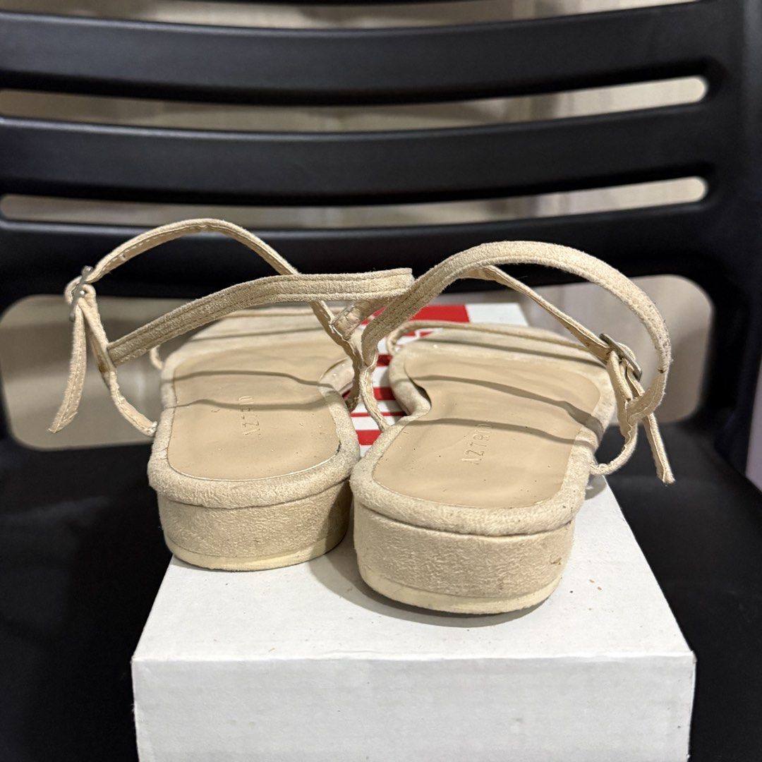Beige Strappy Platform Sandals (Category: Flats & Sandals) located in Makati City. Submitted by julyco. (Listing ID 1465828757, Image 2). Description: - Brand: Astrid - Color: Versatile beige - Style: Platform sandals with thin multi-straps and buckle closure - Heel: Low wedge heel wrapped in matching fabric - Inclusions: Comes with original white shoebox - Perfect for: Easy pairing with various casual outfits.