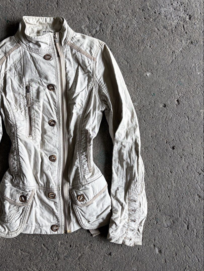 Beige utility jacket with zipper and button (Category: Coats, Jackets and Outerwear) located in Quezon City. Submitted by ward.drobe (Listing ID 1465785032, Image 2). Description: Size L - 25 - inch Bust - 17 inch Sleeve L - 25 inch.
